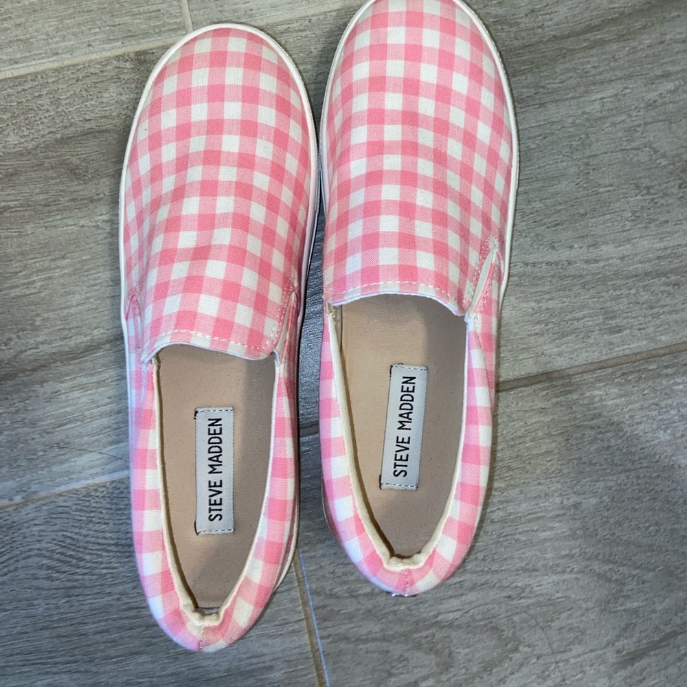 Pink Steve Madden platform sneakers.